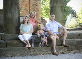 Family portrait photography in Tuscaloosa, Alabama at Capitol Park. Taken by a Tuscaloosa photographer.