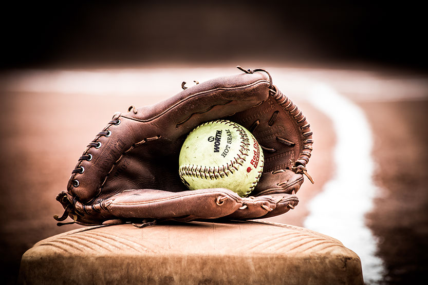 Fine art photography by a Tuscaloosa, Alabama photographer. Softball in glove. Taken by a Tuscaloosa photographer.
