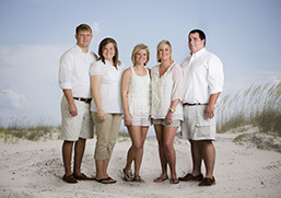 Family portrait photography taken in Tuscaloosa, Alabama. The people were photographed sepeately and then photoshoped on the beach.