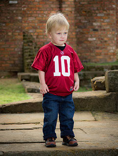 Little boy in Alabama Crimson Tide jersey. Roll Tide! Taken by photographer in Tuscaloosa, Alabama.